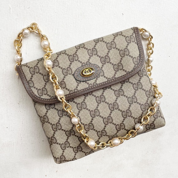 Gucci Handbags - Gucci GG Monogram Vintage Mini Bag w/Pearl Chain